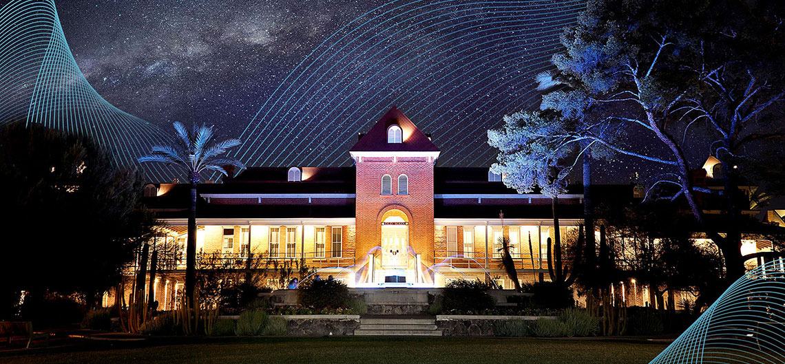 Old Main with digital patterns at night with Milky Way