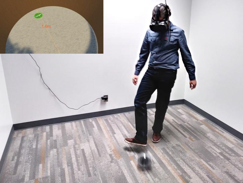 Man wearing VR headset kicking ball in lab